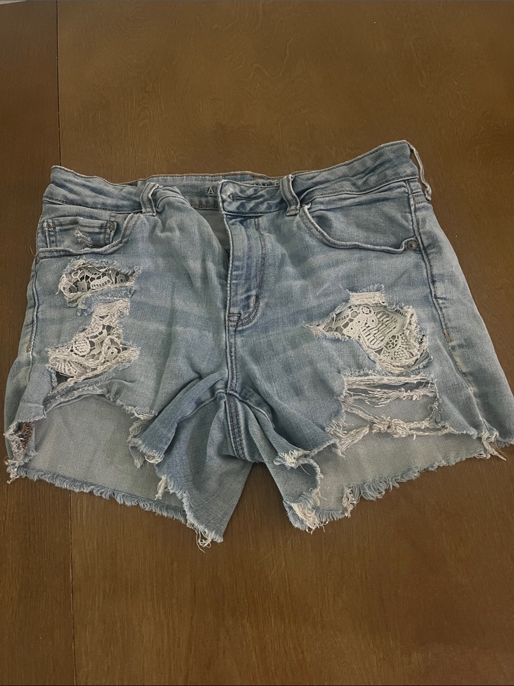 American Eagle Outfitters Light Blue Distressed Denim Shorts with Lace Panels